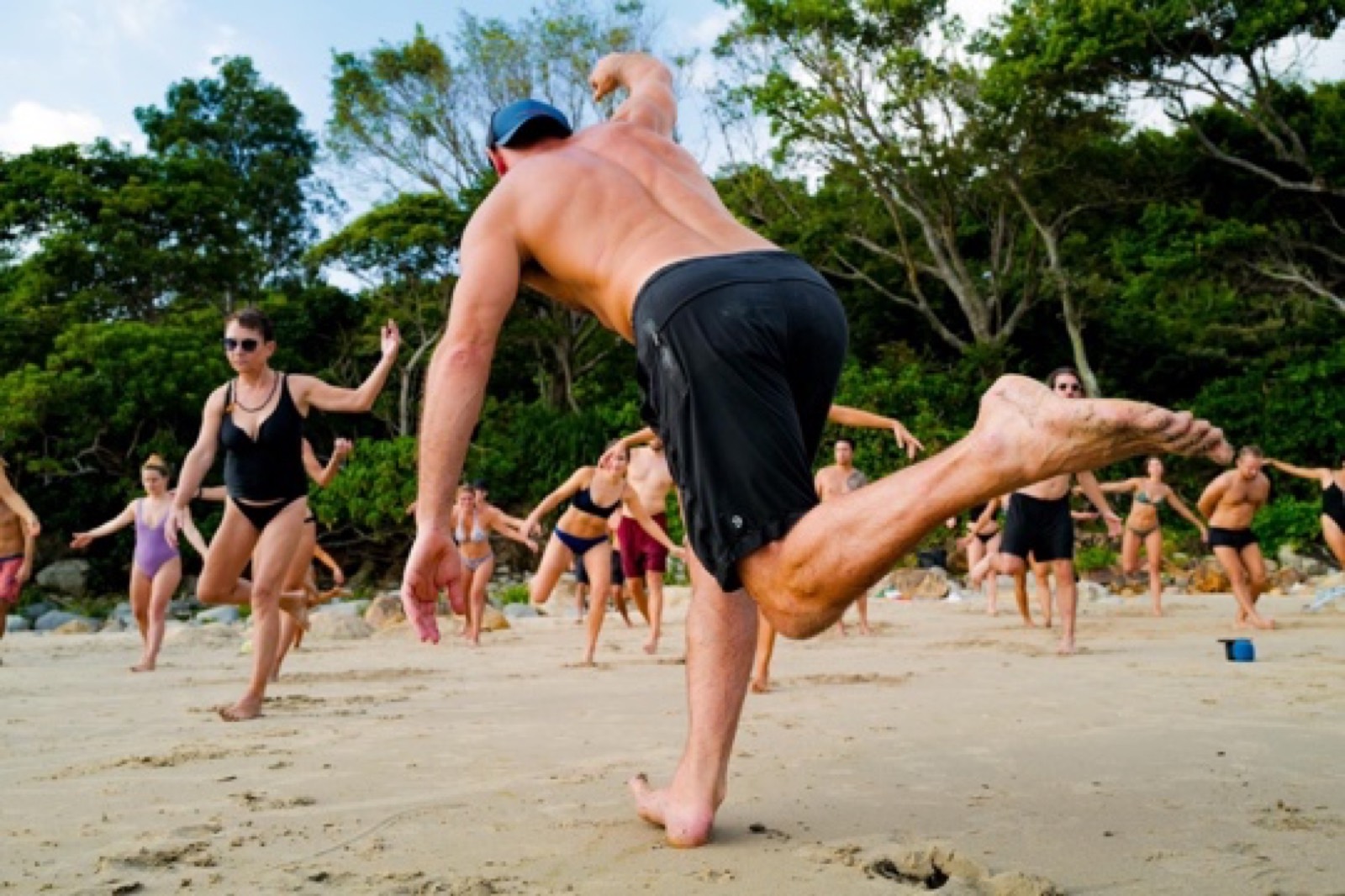 Group movement practice on the beach